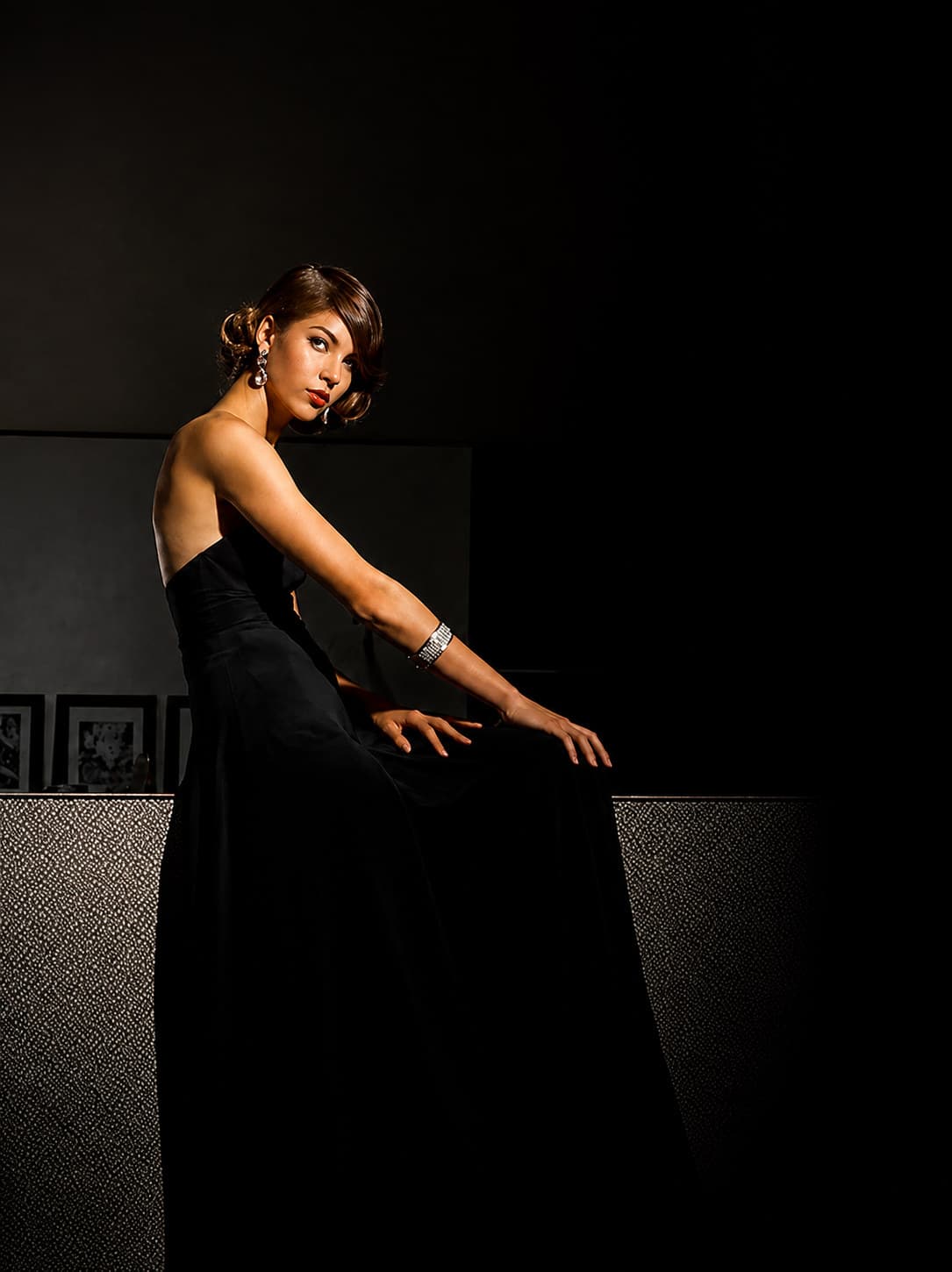 Evening makeup and hair by Dyana Aives — model in a black gown